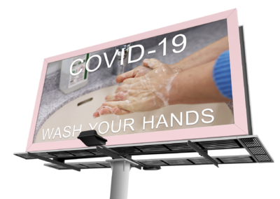 Covid 19 Wash Hands Message and graphic on pink billboard