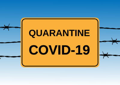 Sky background with Yellow Quarantine Covid 19 sign attached to barbed wire