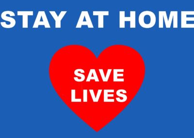 Blue sign with red heart and stay at home save lives message